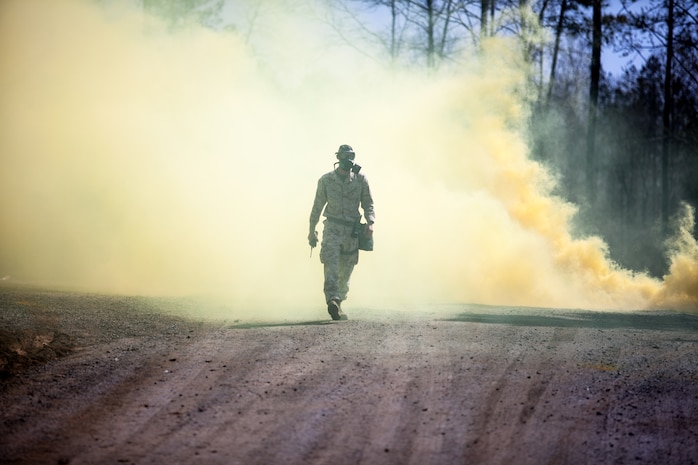 Marines and Sailors of the Chemical Biological Incident Response Force, II Marine Expeditionary Force, conduct a live chemical agent exercise at Fort A.P. Hill, Virginia on April 10. The unit conducted simulated casualty extraction in clouds of CS gas to prepare for real life evacuation situations. In order to execute its mission, CBIRF possesses a wide variety of unique skill sets that are task organized to address all possible aspects of a CBRNE attack. CBIRF has six major sections organic to the battalion: Explosive Ordnance Disposal, Technical Search and Rescue, Decontamination, Medical, Identification and Detection, and Search and Rescue/Casualty Extraction. (Official Marine Corps Photo by Sgt Kuande L. Hall/Released)


