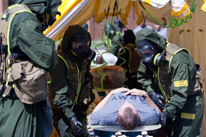 Marines and Sailors with the Chemical Biological Incident Response Force conduct training along with local first responders during Exercise Capital Shield. Capital Shield is a regional training exercise coordinated by Joint Force Headquarters - National Capital Region in coordination with the DoD. (Official Marine Corps Photo by Sgt Kuande L Hall/RELEASED)


