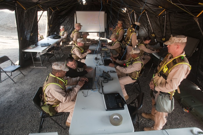 Marines and Sailors with the Chemical Biological Incident Response Force conduct training along with local first responders during Exercise Capital Shield. Capital Shield is a regional training exercise coordinated by Joint Force Headquarters - National Capital Region in coordination with the DoD. (Official Marine Corps Photo by Sgt Kuande L Hall/RELEASED)


