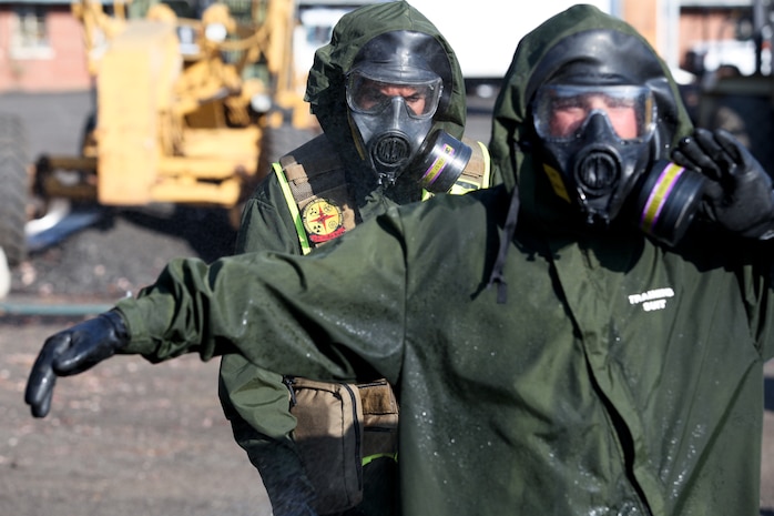 Marines and Sailors with the Chemical Biological Incident Response Force conduct training along with local first responders during Exercise Capital Shield. Capital Shield is a regional training exercise coordinated by Joint Force Headquarters - National Capital Region in coordination with the DoD. (Official Marine Corps Photo by Sgt Kuande L Hall/RELEASED)


