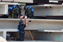 Marines and Sailors with the Chemical Biological Incident Response Force conduct training along with local first responders during Exercise Capital Shield. Capital Shield is a regional training exercise coordinated by Joint Force Headquarters - National Capital Region in coordination with the DoD. (Official Marine Corps Photo by Sgt Kuande L Hall/RELEASED)


