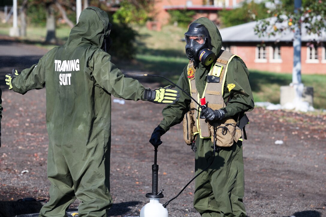 Marines and Sailors with the Chemical Biological Incident Response Force conduct training along with local first responders during Exercise Capital Shield. Capital Shield is a regional training exercise coordinated by Joint Force Headquarters - National Capital Region in coordination with the DoD. (Official Marine Corps Photo by Sgt Kuande L Hall/RELEASED)


