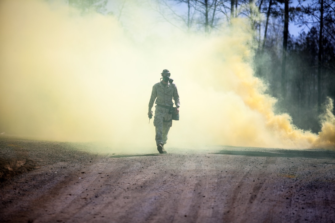 Marines and Sailors of the Chemical Biological Incident Response Force, II Marine Expeditionary Force, conduct a live chemical agent exercise at Fort A.P. Hill, Virginia on April 10. The unit conducted simulated casualty extraction in clouds of CS gas to prepare for real life evacuation situations. In order to execute its mission, CBIRF possesses a wide variety of unique skill sets that are task organized to address all possible aspects of a CBRNE attack. CBIRF has six major sections organic to the battalion: Explosive Ordnance Disposal, Technical Search and Rescue, Decontamination, Medical, Identification and Detection, and Search and Rescue/Casualty Extraction. (Official Marine Corps Photo by Sgt Kuande L. Hall/Released)


