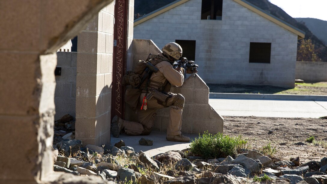 U.S. Marine Cpl. Brendan Berndt posts security during interoperability training aboard Camp Pendleton, Calif., Nov. 20, 2014. Berndt is a slack man with the 15th Marine Expeditionary Unit’s Maritime Raid Force. Interop gives the 15th MEU’s MRF and Security Element an opportunity to work together and support each other in preparation for a deployment in the spring. 