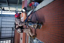 Marines and sailors with the Chemical Biological Incident Response Force conducted an annual training exercise alongside the New York City Fire Department at a training academy in Randall's Island, New York. CBIRF conducted rope rescue, vehicle extrication, structural collapse and confined space training during the week long exercise. The event culminated with a night operation at the Barclay's Center in Brooklyn, where Marines and sailors rescued role-playing casualties from a simulated bomb explosion. The mission of CBIRF is to forward-deploy and/or respond, when directed, to a credible threat of chemical, biological, radiological, nuclear or high-yield explosive incident in order to assist local, state or federal agencies and unified combat commanders in the conduct of consequence management operations. (Official Marine Corps Photo by Sgt Kuande Hall/RELEASED)



