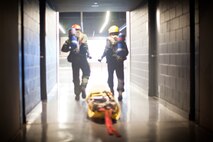 Marines and sailors with the Chemical Biological Incident Response Force conducted an annual training exercise alongside the New York City Fire Department at a training academy in Randall's Island, New York. CBIRF conducted rope rescue, vehicle extrication, structural collapse and confined space training during the week long exercise. The event culminated with a night operation at the Barclay's Center in Brooklyn, where Marines and sailors rescued role-playing casualties from a simulated bomb explosion. The mission of CBIRF is to forward-deploy and/or respond, when directed, to a credible threat of chemical, biological, radiological, nuclear or high-yield explosive incident in order to assist local, state or federal agencies and unified combat commanders in the conduct of consequence management operations. (Official Marine Corps Photo by Sgt Kuande Hall/RELEASED)


