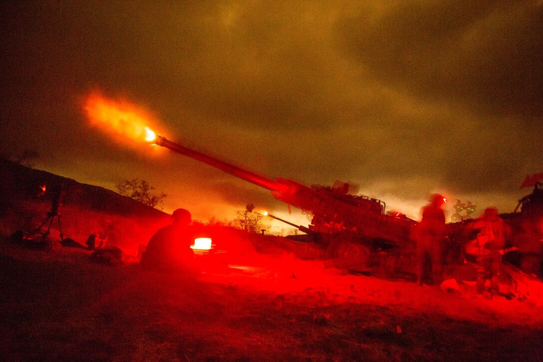 U.S. Marines with India Battery, Battalion Landing Team 3rd Battalion, 1st Marine Regiment, 15th Marine Expeditionary Unit, carry out a fire mission during MEU Exercise 14 aboard Camp Pendleton, Calif., Nov. 20, 2014. The purpose of MEUEX is to train the different elements of the 15th MEU to work together to complete a wide variety of missions. (U.S. Marine Corps photo by Sgt. Jamean R. Berry/Released)