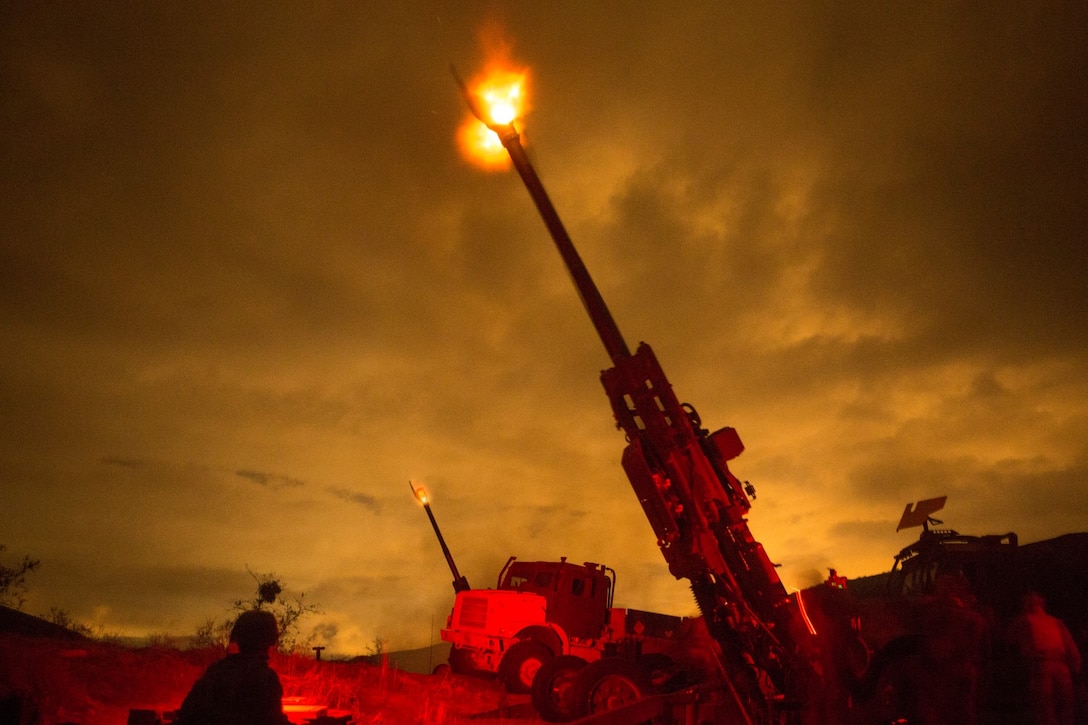 U.S. Marines with India Battery, Battalion Landing Team 3rd Battalion, 1st Marine Regiment, 15th Marine Expeditionary Unit, carry out a fire mission during MEU Exercise 14 aboard Camp Pendleton, Calif., Nov. 20, 2014. The purpose of MEUEX is to train the different elements of the 15th MEU to work together to complete a wide variety of missions. (U.S. Marine Corps photo by Sgt. Jamean R. Berry/Released)