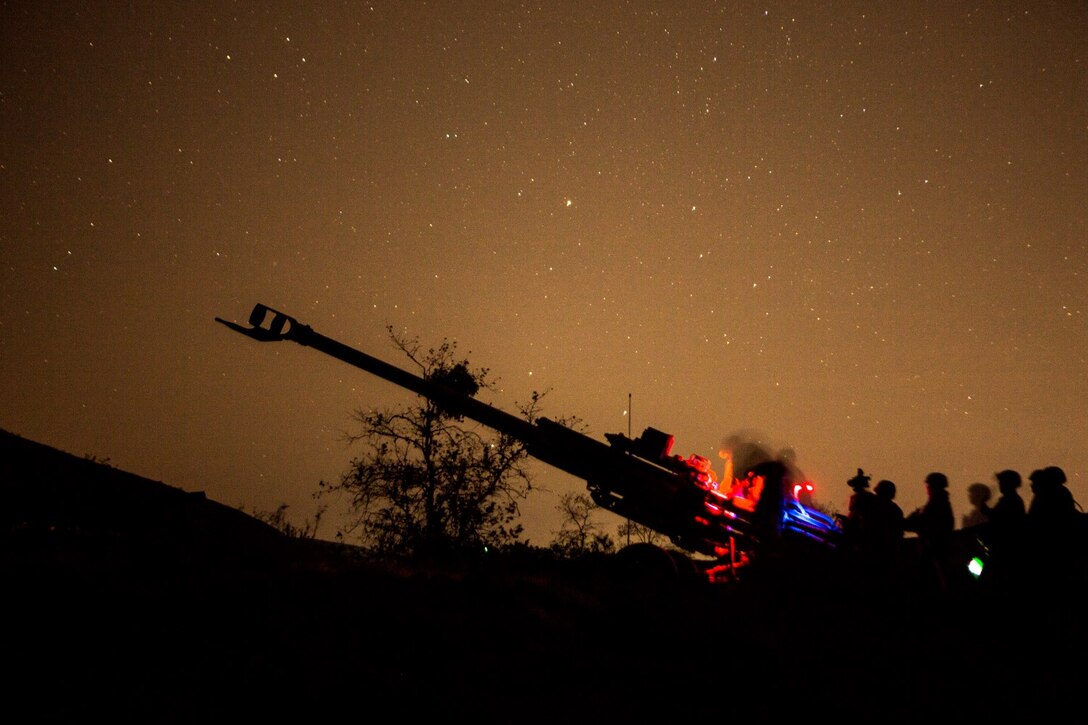 U.S. Marines with India Battery, Battalion Landing Team 3rd Battalion, 1st Marine Regiment, 15th Marine Expeditionary Unit, prepare to receive fire missions during MEU Exercise 14 aboard Camp Pendleton, Calif., Nov. 19, 2014. The purpose of MEUEX is to train the different elements of the 15th MEU to work together to complete a wide variety of missions. (U.S. Marine Corps photo by Sgt. Jamean R. Berry/Released)