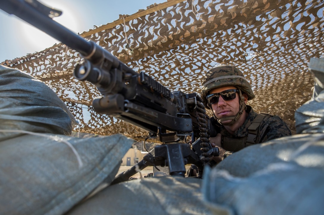 U.S. Marine Lance Cpl. Corey W. Dahmen provides security during non-combatant evacuation operation training aboard Camp Pendleton, Calif., Nov. 19, 2014. Dahmen is a rifleman with Lima Company, Battalion Landing Team 3rd Battalion, 1st Marine Regiment, 15th Marine Expeditionary Unit. The training is designed to improve Marines’ tactics in assisting the Department of State in evacuating U.S. citizens and civilian personnel from foreign nations to an appropriate safe haven. (U.S. Marine Corps photo by Sgt. Emmanuel Ramos/Released)