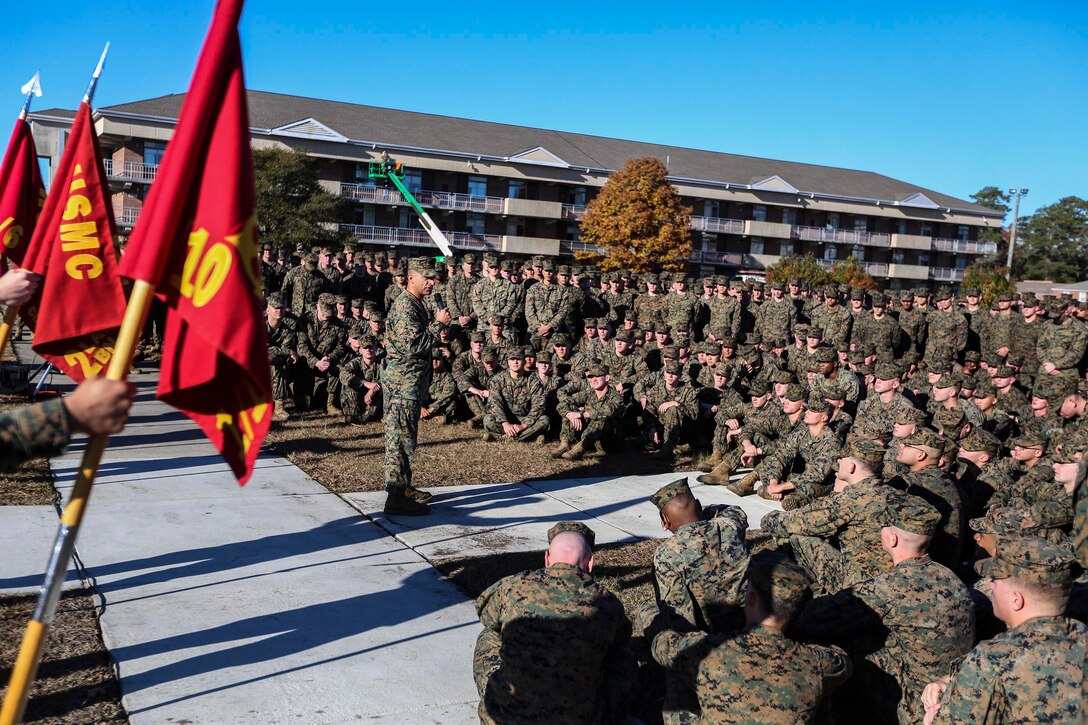 U.S. Marine Corps Lt. Col. Paul Merida, Battalion Landing Team (BLT) 1st Battalion, 6th Marine Regiment, speaks to his battalion after decompositing from the 22nd Marine Expeditionary Unit (MEU) Dec. 1, 2014, at Marine Corps Base Camp Lejeune, N.C. The MEU completed a nine-month deployment to the U.S. 5th and 6th Fleet areas of operation with the Bataan Amphibious Ready Group. (U.S. Marine Corps photo by Sgt. Austin Hazard/Released)