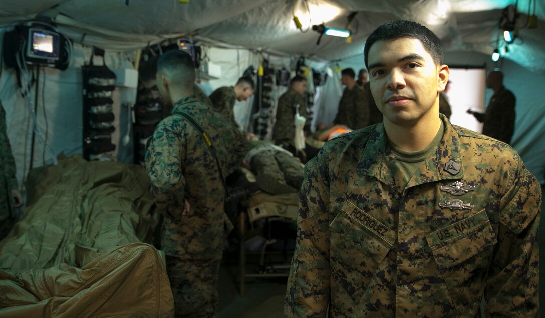 Petty Officer 1st Class Wilson Rodriguez, Jr., a surface force independent duty corpsman, stands inside a shock trauma platoon aid station here Nov. 18. An independent duty corpsman is a hospital corpsman who has completed a yearlong course that increases their knowledge on emergency, clinical and acute medicine and administrative skills. The independent duty corpsman also mentors and teaches junior corpsmen. Rodriguez is a native of Cleveland and is assigned to Combat Logistics Battalion 31, 31st Marine Expeditionary Unit. 
