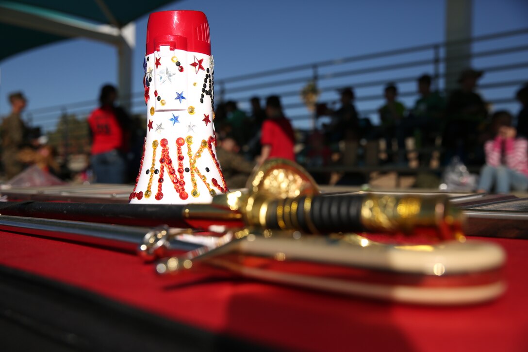 A Mameluke sword and non-commissioned officer’s sword are displayed during the Lifestyle Insights Networking Knowledge Skills’ Combined Arms Exercise for Kids at Felix Field, Nov. 25, 2014. LINKS CAX for Kids is a bi-annual event that teaches children about the Marine Corps. (Official Marine Corps Photo by Lance Cpl. Julio McGraw/Released)