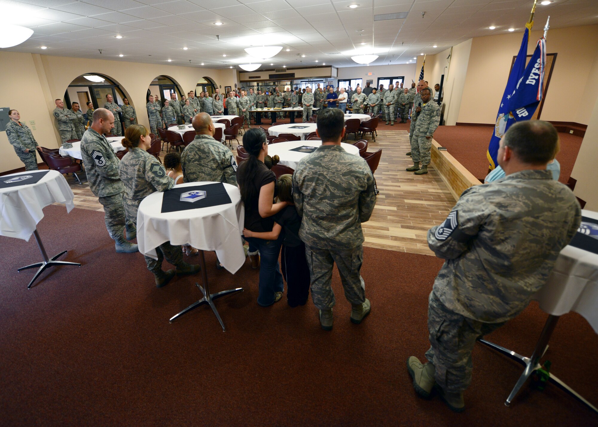 Chief Master Sgt. Eddie Webb, 7th Bomb Wing command chief, speaks to Dyess’ newest chief-selects and their families during the chief master sergeant promotion party Nov. 21, 2014, at Dyess Air Force Base, Texas. The chief-selects were congratulated by their leadership and peers for achieving the highest rank in the enlisted force. (U.S. Air Force photo by Airman 1st Class Kedesha Pennant/Released)