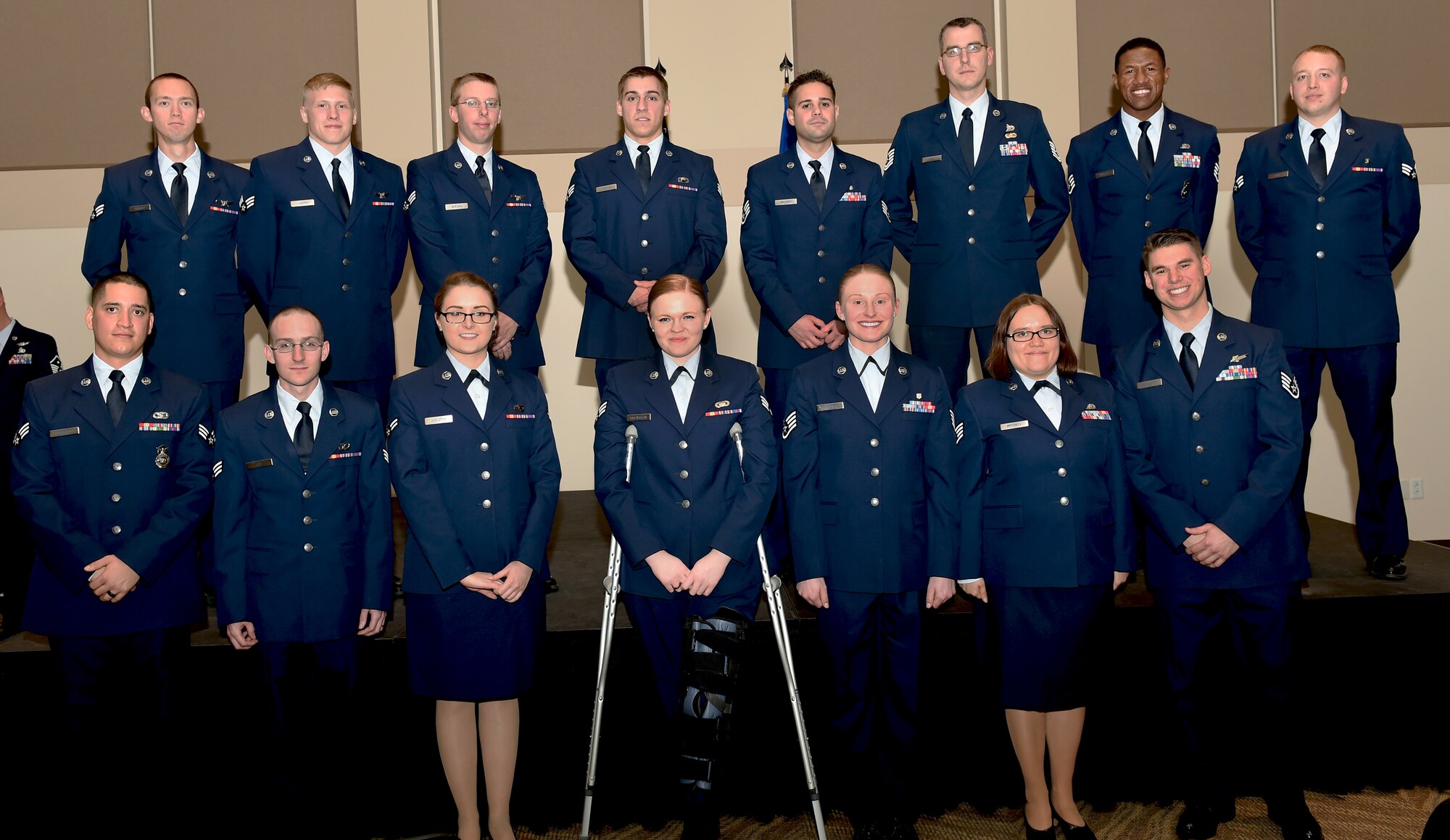 Fifteen Team Buckley members were promoted to their next ranks Dec. 1, 2014, at the Leadership Development Center on Buckley Air Force Base, Colo. A promotion ceremony is a time-honored tradition in the Air Force, allowing co-workers, family and friends to support and congratulate Airmen on their promotion. (U.S. Air Force photo by Airman 1st Class Samantha Saulsbury/Released)
