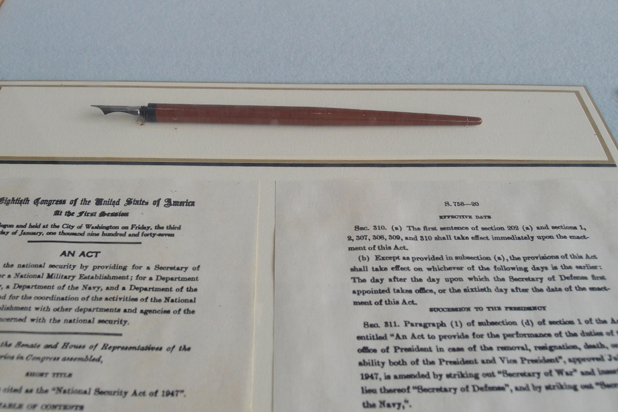 DAYTON, Ohio -- Copies of the National Security Act of 1947 and Executive Order 9877, along with the pen with which President Harry Truman signed the Act, are on display in the Presidential Gallery at the National Museum of the United States Air Force. (U.S. Air Force photo)
