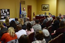 Col. Kevin Kennedy, 28th Bomb Wing commander, speaks with members of the Key Spouse program in the Dakota’s Club at Ellsworth Air Force Base, S.D., Nov. 18, 2014 during a town hall meeting aimed at finding new ways to raise awareness for the Key  Spouses program and encourage involvement from all Ellsworth families. The Key Spouse program is an official Air Force program designed to enhance readiness and establish a sense of Air Force community, to promote partnerships between unit leadership, Key Spouses, and families as well as base and community agencies. (U.S. Air Force photo by Senior Airman Zachary Hada/Released)