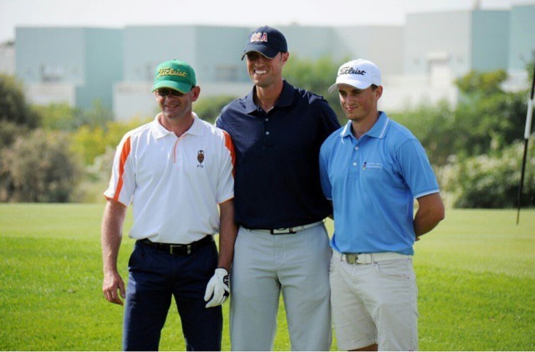 Air Force SMSgt Spencer Mims (center) wins the Men's Senior Division gold medal.  The US Men and Women Armed Forces Golf teams won respective gold medals for the seventh time during the 8th CISM World Military Golf Championship held in Bahrain 13-21 November 2014.