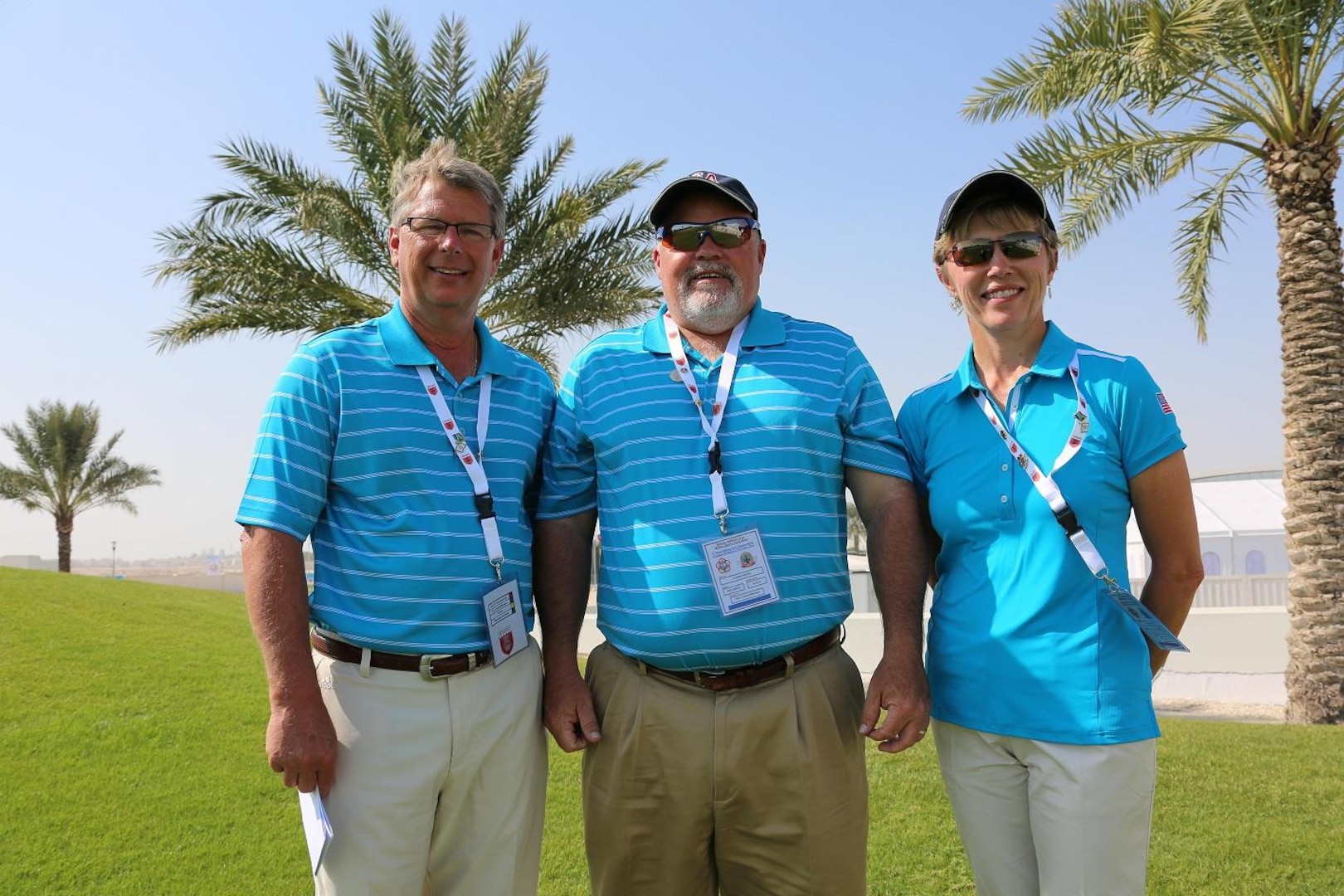 The US Armed Forces Golf team leadership from left to right: Coach - Mr. Doug Quirie (USAF); Team Captain - Mr. James Senn (Navy Sports Director); and Chief of Mission - CAPT Lisa Potvin (Navy).  The US Men and Women Armed Forces Golf teams won respective gold medals for the seventh time during the 8th CISM World Military Golf Championship held in Bahrain 13-21 November 2014.