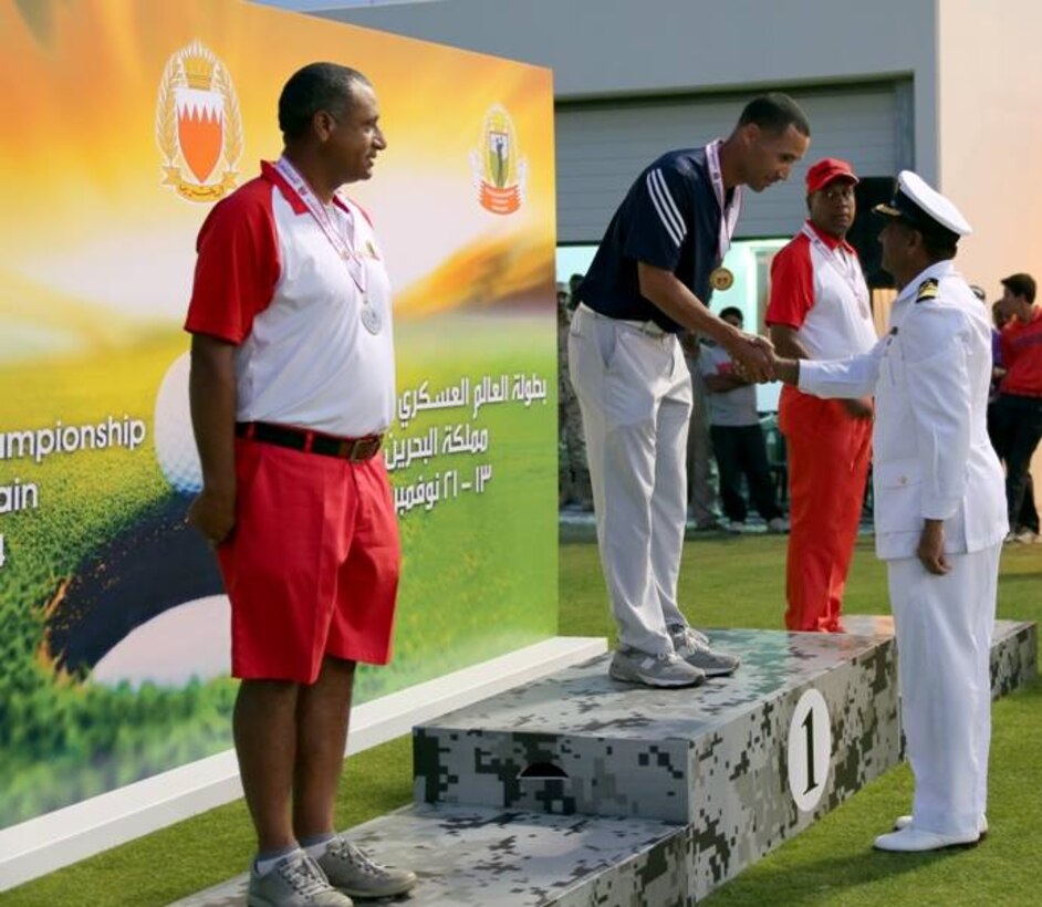 Air Force Sen. Master Sgt. Spencer Mims captures the Men's Senior Division gold medal.  The US Men and Women Armed Forces Golf teams won respective gold medals for the seventh time during the 8th CISM World Military Golf Championship held in Bahrain 13-21 November 2014.