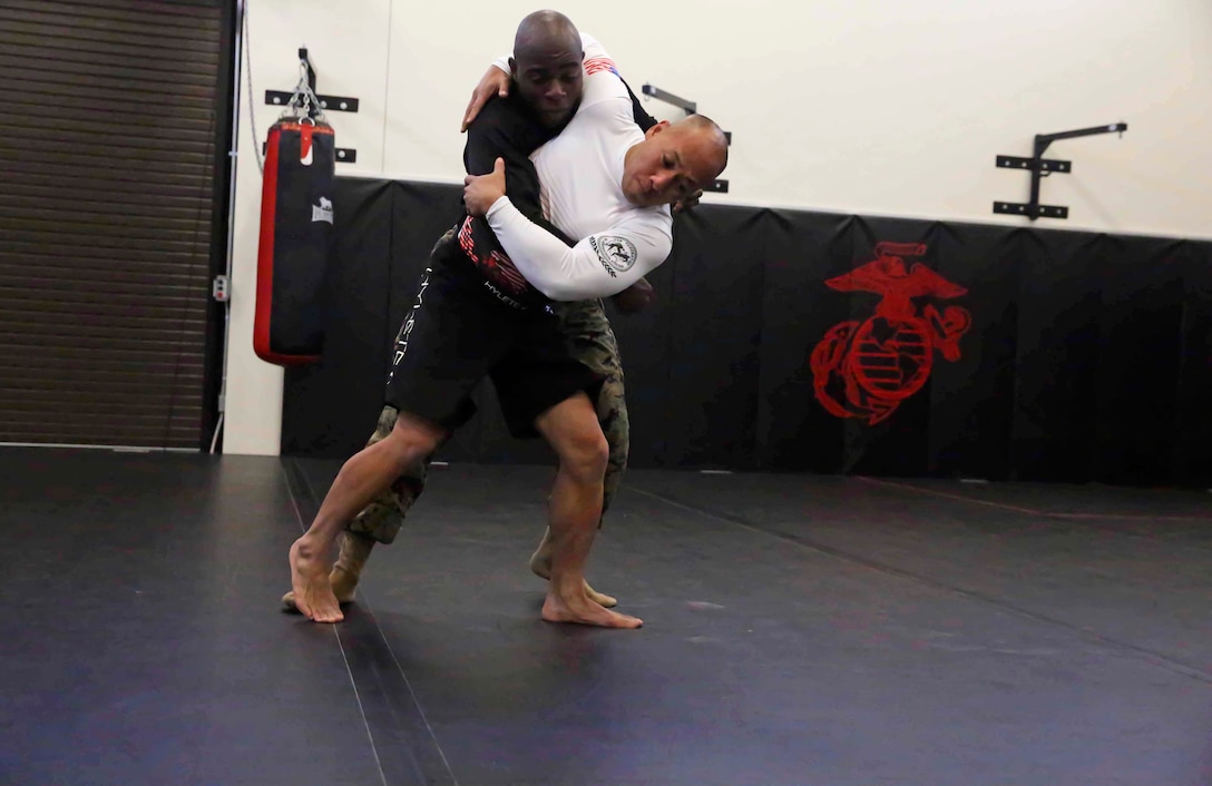 Major Jackson Doan, operation officer, Edson Range, Weapons Field Training Battalion, Marine Corps Base Camp Pendleton, practices his martial arts techniques at Marine Corps Base Camp Pendleton, Nov. 19. Doan is an Oceanside, Calif., native and is the current Pankration World Champion in the 145 pound weight class.