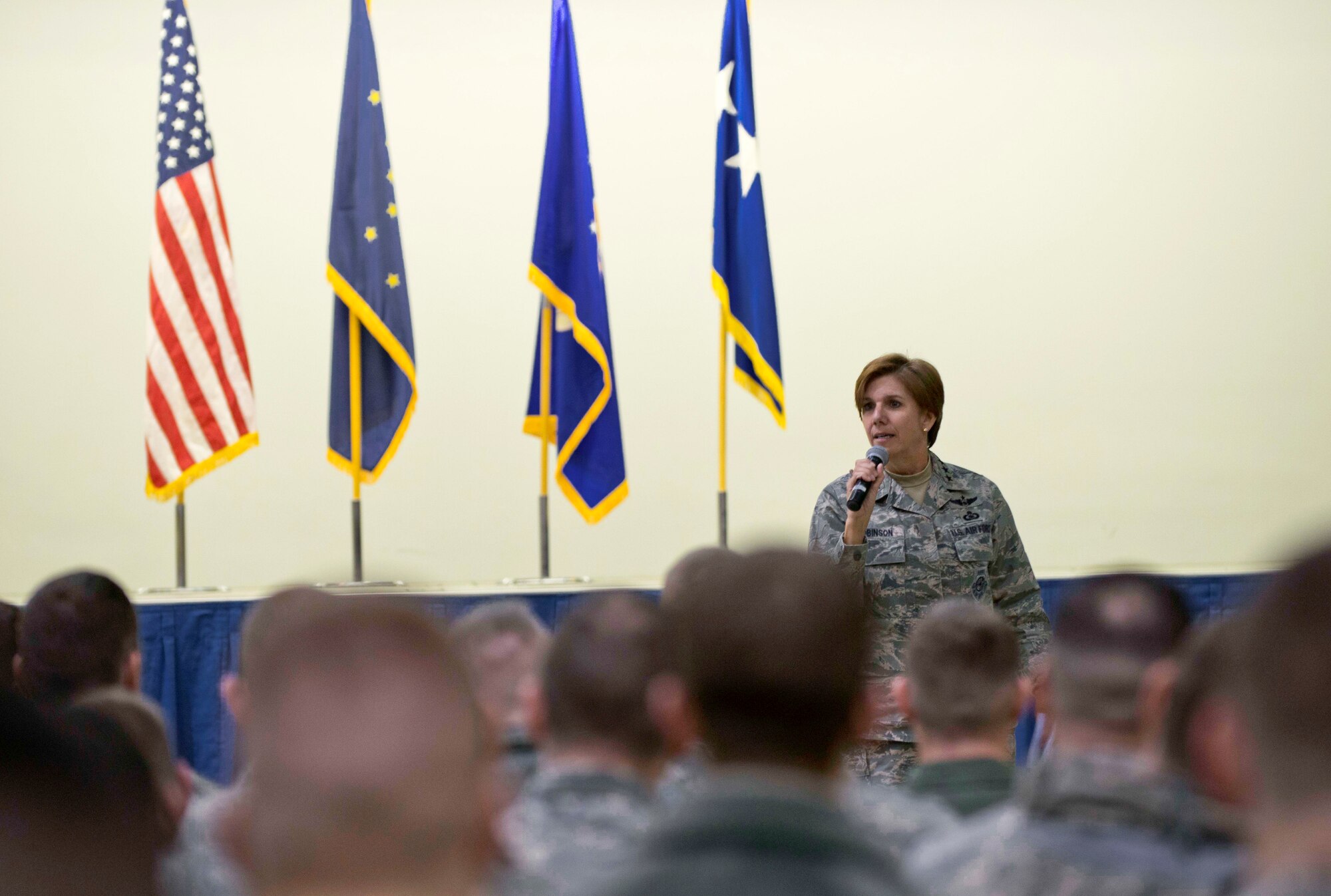 Air Force Gen. Lori Robinson, Pacific Air Forces commander, addresses Airmen and Soldiers during an all-call at Joint Base Elmendorf-Richardson, Alaska, Dec. 2, 2014. General Robinson, who assumed command of PACAF in October, visited Airmen and families and witnessed JBER missions and operations during a trip to the base Chief Master Sgt. Harold Hutchison, PACAF command chief. (U.S. Air Force photo/Staff Sgt. Sheila deVera-RELEASED)