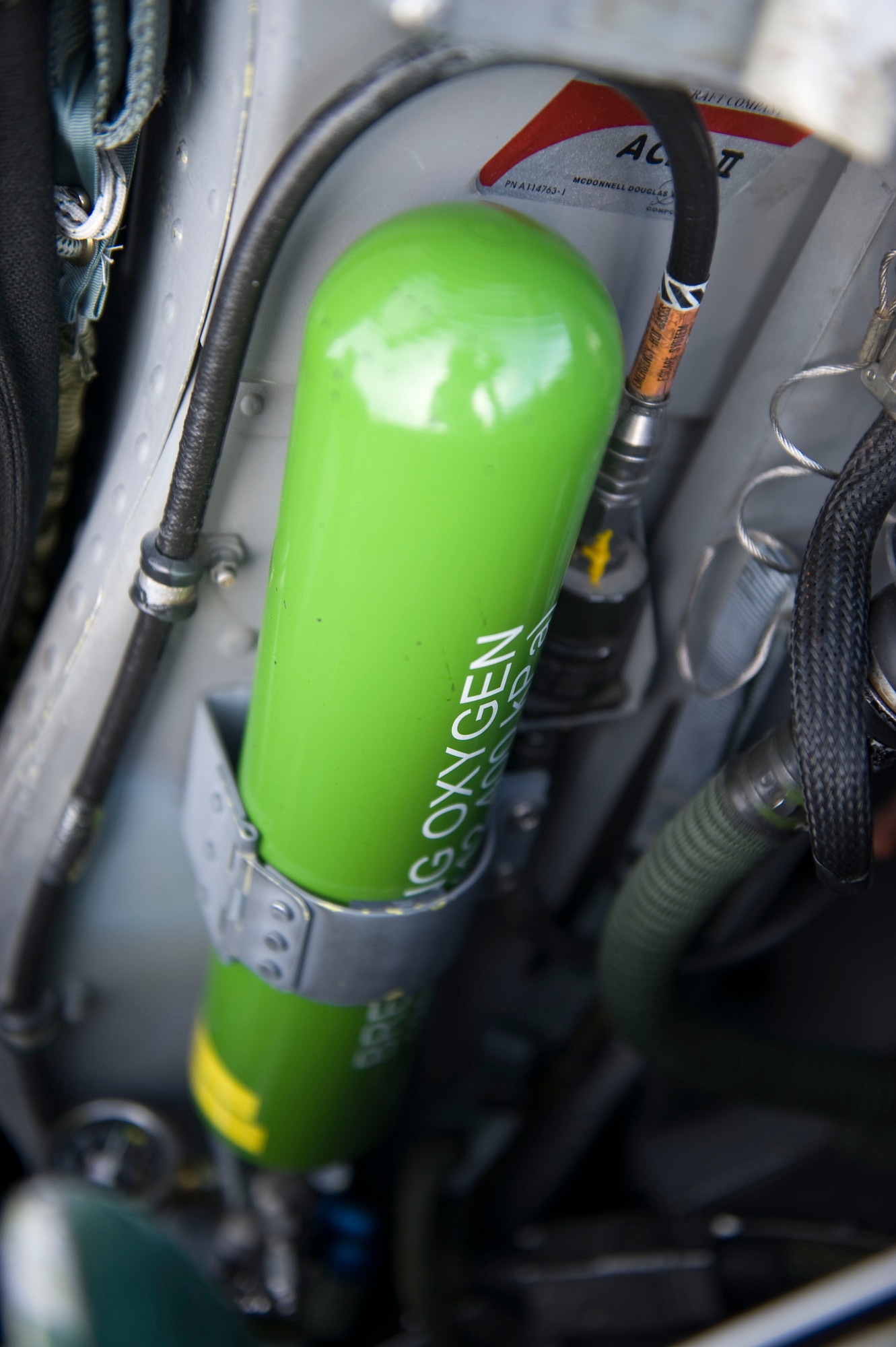 This Regulated Emergency Oxygen System, or REOS, bottle in the F-16 Fighting Falcon Block 50 model, is the pilot’s emergency oxygen supply in the event the pilot needs to eject from the aircraft. Prior to Master Sgt. Shane Sneary’s idea, each bottle had to be replaced every five years at a cost of $1,400 to $1,800; now REOS bottles can be tested locally to prolong their lifespan, potentially saving the Air Force hundreds of thousands of dollars every year. (U.S. Air Force photo by Airman 1st Class Mikaley Towle)
