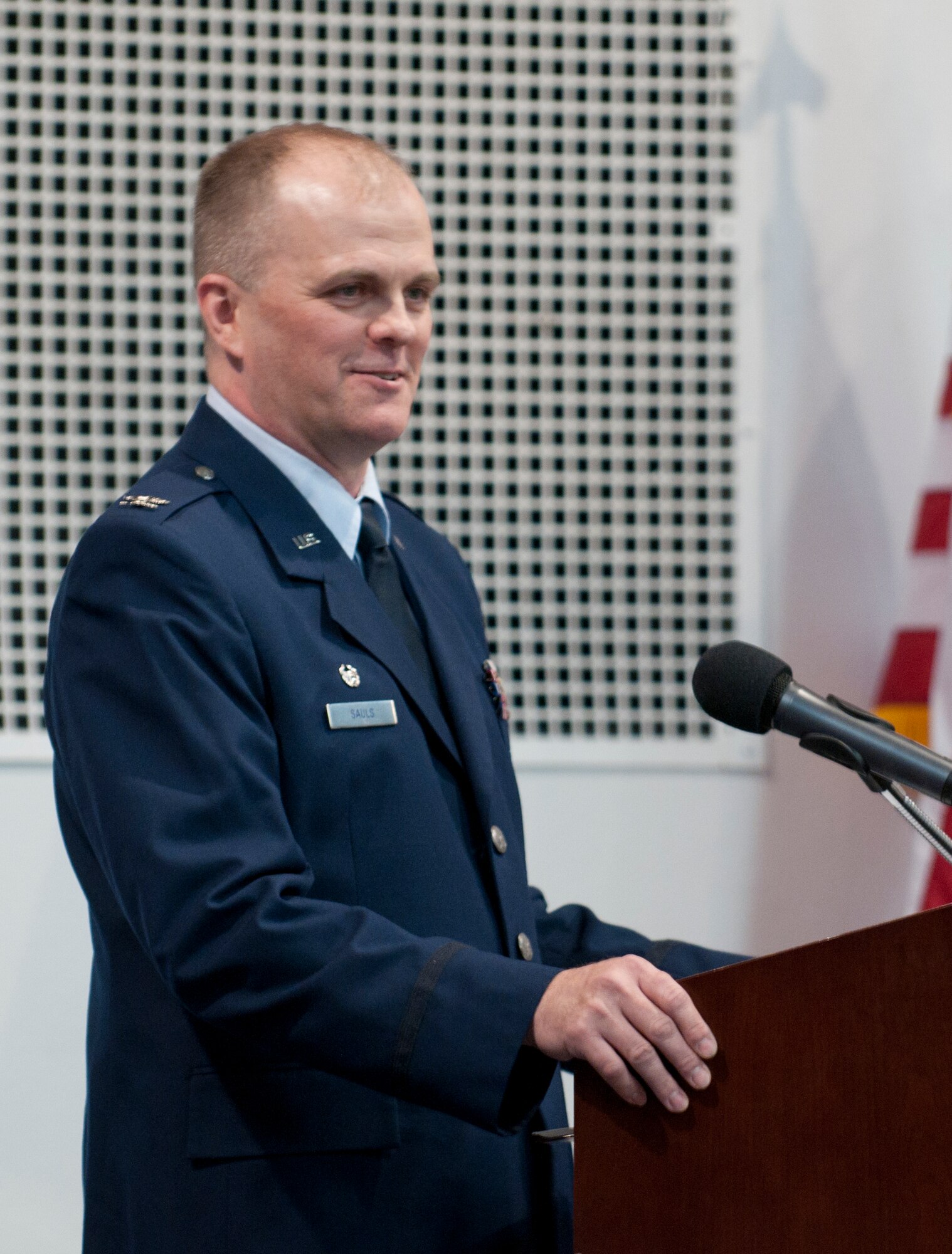 Col. Todd Sauls, 90th Operations Group commander, gives his comments after officially becoming the 90th OG commander Dec. 3, 2014 in the Fall Hall community center on F.E. Warren Air Force Base, Wyo. Sauls has served as the operations officer of the 381st Training Support Squadron, 392nd Training Squadron, 490th Missile Squadron and was commander of the 341st Operations Support Squadron. (U.S. Air Force photo/ Airman 1st Class Malcolm Mayfield)
