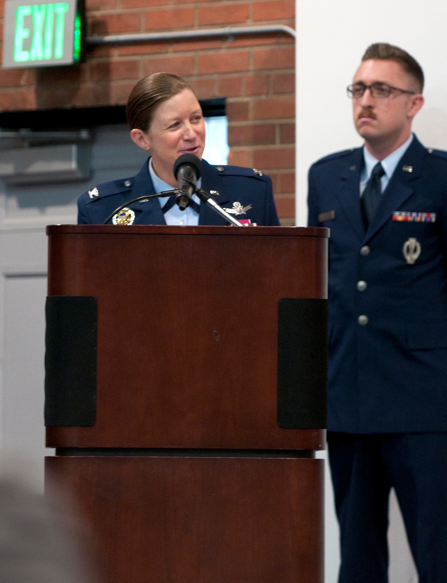 Col. Tracey Hayes, 90th Missile Wing commander, gives her comments at the 90th Operations Group change-of-command ceremony in the Fall Hall community center on F.E. Warren Air Force Base, Wyo., Dec. 3, 2014. (U.S. Air Force photo/ Airman 1st Class Malcolm Mayfield)