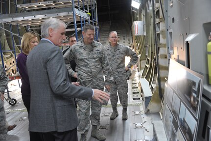 Kevin Haley (left), 502nd Trainer Development Squadron civilian leader, briefs Gen. Robin Rand (center), commander of Air Education and Training Command, and Brig. Gen. Bob LaBrutta, 502nd Air Base Wing and Joint Base San Antonio commander, Nov. 20 during an immersion tour at JBSA-Randolph on the construction of the C-17 Globemaster III platform. (U.S. Air Force photo by Lynsie Nichols)

