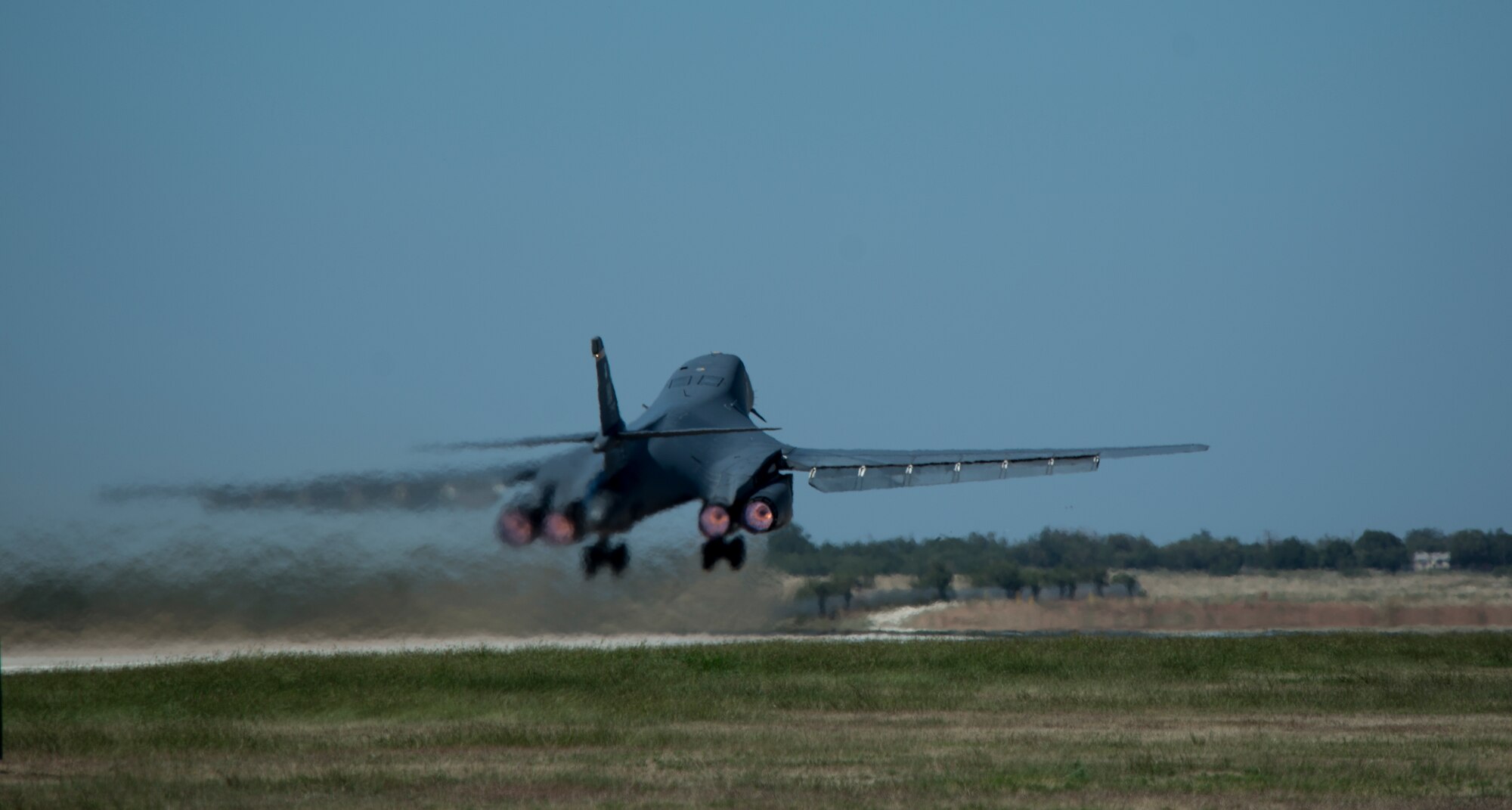 A B-1B Lancer takes off Oct. 2, 2014, at Dyess Air Force Base, Texas. B-1B Lancers, F-16 Fighting Falcons, F-22 Raptors, F-15E Strike Eagles and other aircraft were flown out to the Atlantic Coast for a Razor Talon exercise. The exercise simulated an environment where global positioning system (GPS) technology had been confiscated, causing the pilots to fly using only visual reference. (U.S. Air Force photo by Senior Airman Peter Thompson/Released)