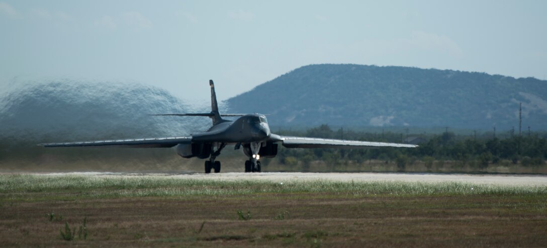 A B-1B Lancer takes off Oct. 2, 2014, at Dyess Air Force Base, Texas. Team Dyess Airmen and B-1B Lancers took the lead role in Razor Talon, a joint-integration exercise, off the coast of North Carolina. Units from other bases teamed up with Dyess to employ targeting techniques which would be used in an operational environment for air superiority. (U.S. Air Force photo by Senior Airman Peter Thompson/Released)