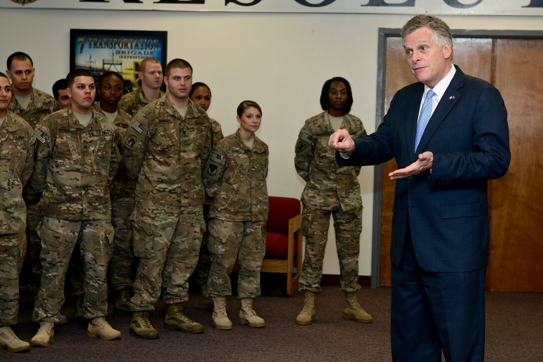 Terry McAuliffe, Virginia governor, meets with Soldiers during a visit to Fort Eustis, Va., Dec. 2, 2014. During his visit, McAuliffe asked the Soldiers questions about their military experiences, and thanked them for their service. (U.S. Air Force photo by Senior Airman Kimberly Nagle/Released)