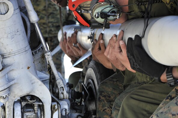 U.S. Marines from Marine Fighter Attack Squadron (VMFA) 232, Marine Corps Air Station Miramar, Cali., prepare to mount an ordnance on a F/A-18C Hornet Nov. 18 on the Tyndall flight line. They participated in the 53rd Weapons Evaluation Group’s Weapon System Evaluation Program. (U.S. Air Force photo by Airman 1st Class Sergio A. Gamboa)