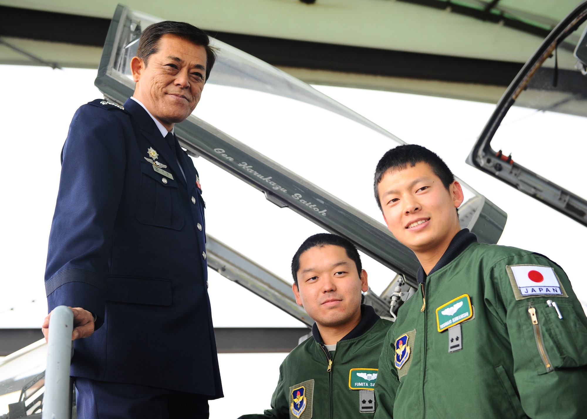 Gen. Harukazu Saitoh, Japan Air Self-Defense Force Chief of Staff, pauses for a photo with 1st Lt. Fumita Sakyu, 49th Fighter Training Squadron, and 1st Lt. Toshiaki Kawanishi, 49th Fighter Training Squadron/15-BBC, Dec. 2 by a T-38C Talon bearing the general’s name. Saitoh visited Columbus AFB for two days to observe the pilot training program and boost morale. (U.S. Air Force photo/Airman Daniel Lile)