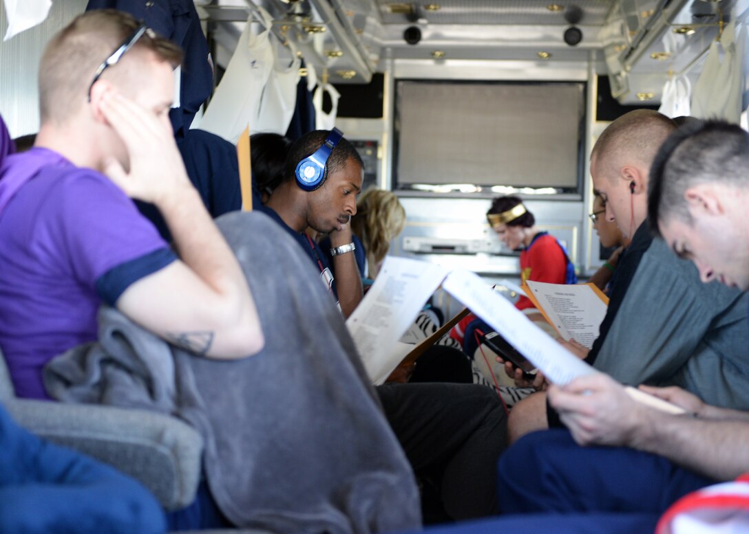 Tops in Blue vocalists rehearse a new song on the road to Keesler Air Force Base, Miss. Oct. 31, 2014. New songs are rehearsed to be performed at later dates in the tour. (U.S. Air Force photo by Airman 1st Class Jimmie D. Pike)(Released)