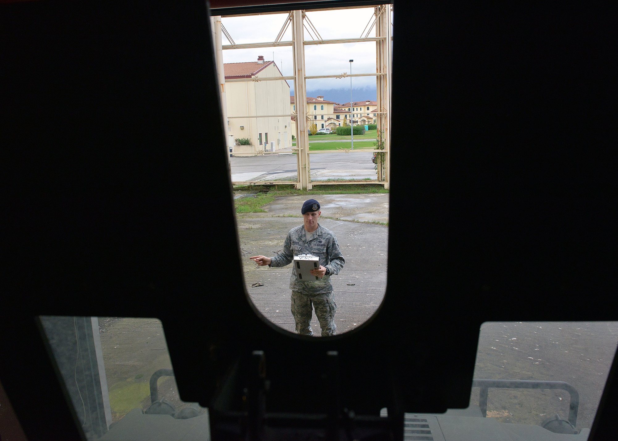 Airman 1st Class Michael Wychcock, 31st Security Forces Squadron assistant vehicle control officer, conducts an inspection on a Humvee, Dec. 12, 2014, at Aviano Air Base, Italy. Wychock is in charge of the overall condition of more than 80 security forces vehicles to include Humvees, trucks, sedans, vans, buses and forklifts. (U.S. Air Force photo/Airman 1st Class Ryan Conroy) 