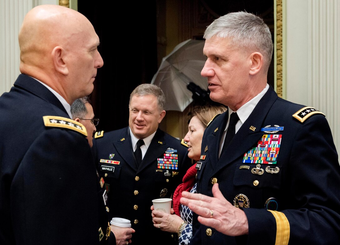 Army Chief of Staff Gen. Ray Odierno, left, and Army Gen. David M. Rodriguez, commander of U.S. Africa Command, speak during a strategic studies seminar at the Eisenhower Executive Office Building in Washington D.C., Dec. 2, 2014.