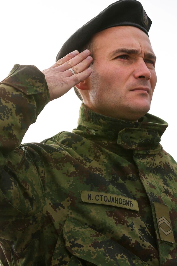 A Serbian soldier is recognized Nov. 17 during the opening ceremony of this year's Exercise Platinum Wolf; more than 250 military participants from seven countries gathered on Serbia's South Base for the commencement. During Platinum Wolf 15, international forces train together as coalitions, developing and improving proficiency of peacekeeping procedures.