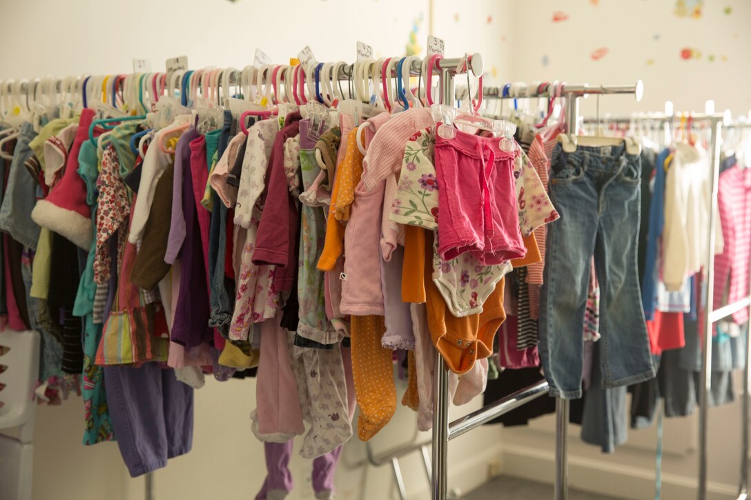 Girls clothing hangs on a rack at Rambling’ Rose Thrift Shop aboard Marine Corps Air Station New River, Nov. 20. The thrift shop has clothing available for children of all ages for very low prices.