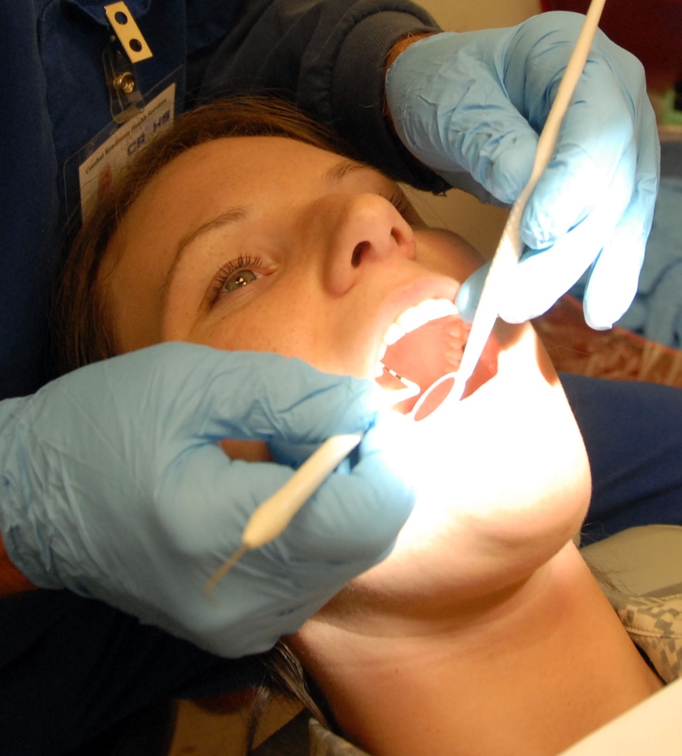 Sgt. Nicole Davidson undergoes a dental exam as part of the Sustained Readiness Program at Marseilles Training Center in preparation for the deployment of 440 Illinois National Guard Soldiers to the Sinai Peninsula in Egypt. Davidson is a member of the 2nd Battalion, 123rd Field Artillery Regiment based in Milan, Ill., which is scheduled to deploy to Egypt in May. The Soldiers will be part of the Multinational Force and Observers. The international peacekeeping force oversees the terms of the 1979 peace treaty between Egypt and Israel.