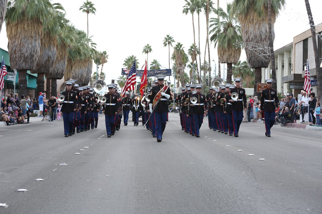 The 3rd Marine Air Wing Band marches to the beat during the Veterans Day Parade in Palm Springs, Calif., Nov. 11, 2014. The drum major for the band was Gunnery Sgt. James Wallace and the enlisted conductor of the band was Staff Sgt. Mark Pellon. (Official Marine Corps photo by Lance Cpl. Julio McGraw/Released)
