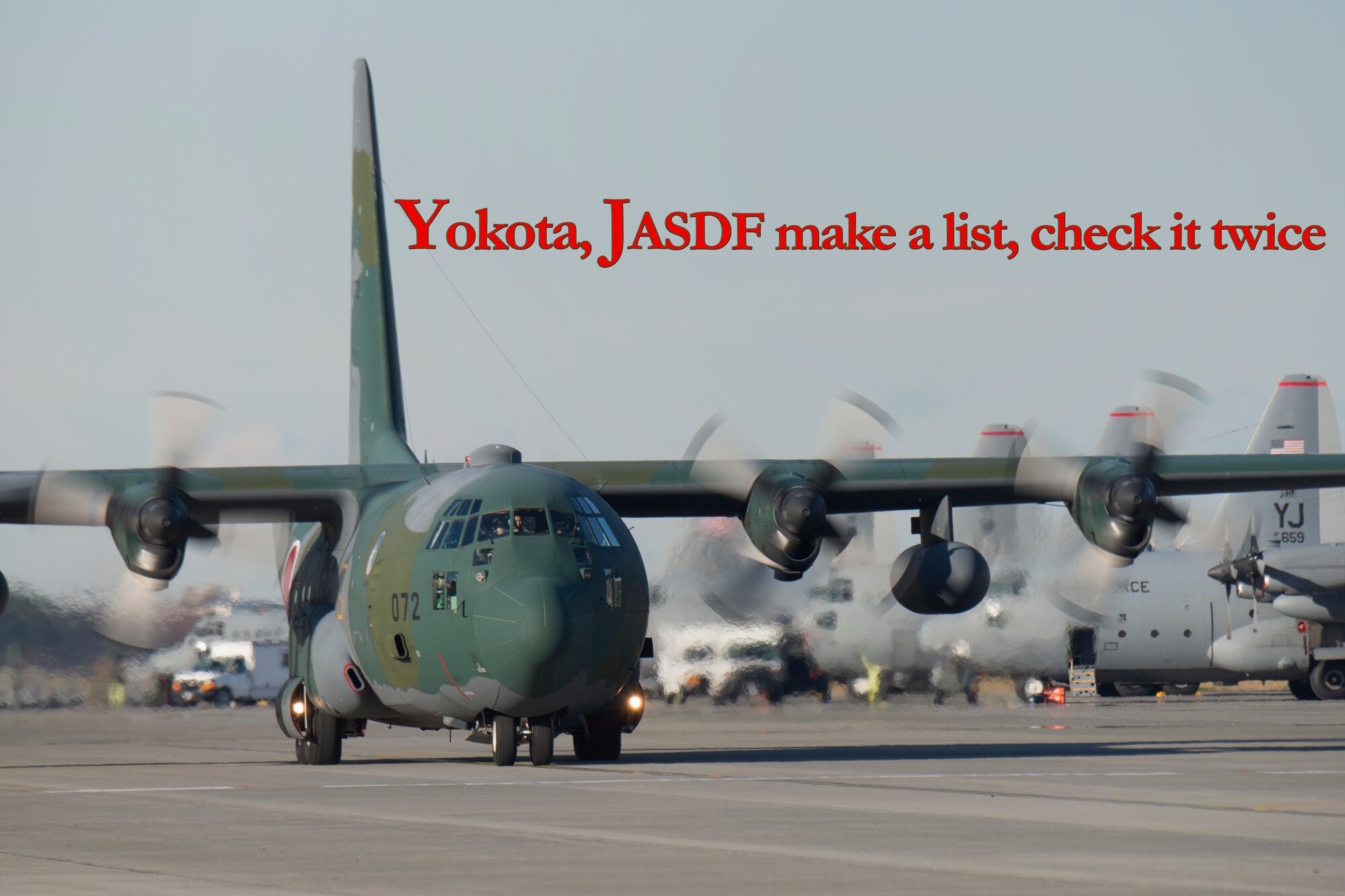 JASDF members from the 401st Squadron delivered Operation Christmas Drop donations as part of 40 tons of humanitarian aid headed to various austere locations throughout the Pacific. (U.S. Air Force photo illustration by Osakabe Yasuo/Released)