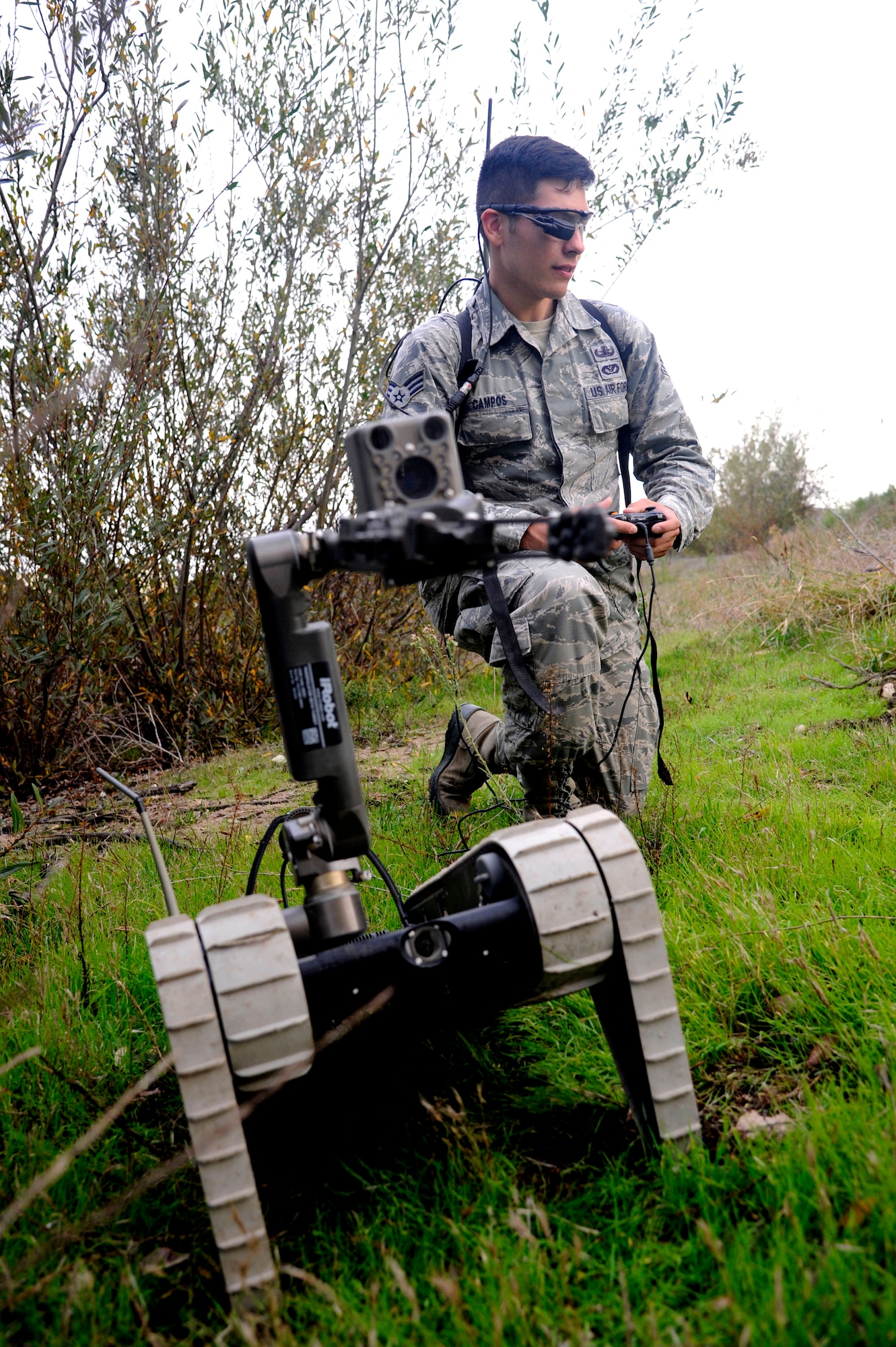 Senior Airman Justin Campos, 30th Civil Engineer Squadron explosive ordnance disposal specialist, operates an iRobot 510 PackBot on Dec. 3, 2014 at Vandenberg Air Force Base, Calif. The PackBot performs bomb disposal, reconnaissance and a wide range of dangerous missions while keeping EOD specialists out of harm’s way. (U.S. Air Force photo by Staff Sgt. Jim Araos)
