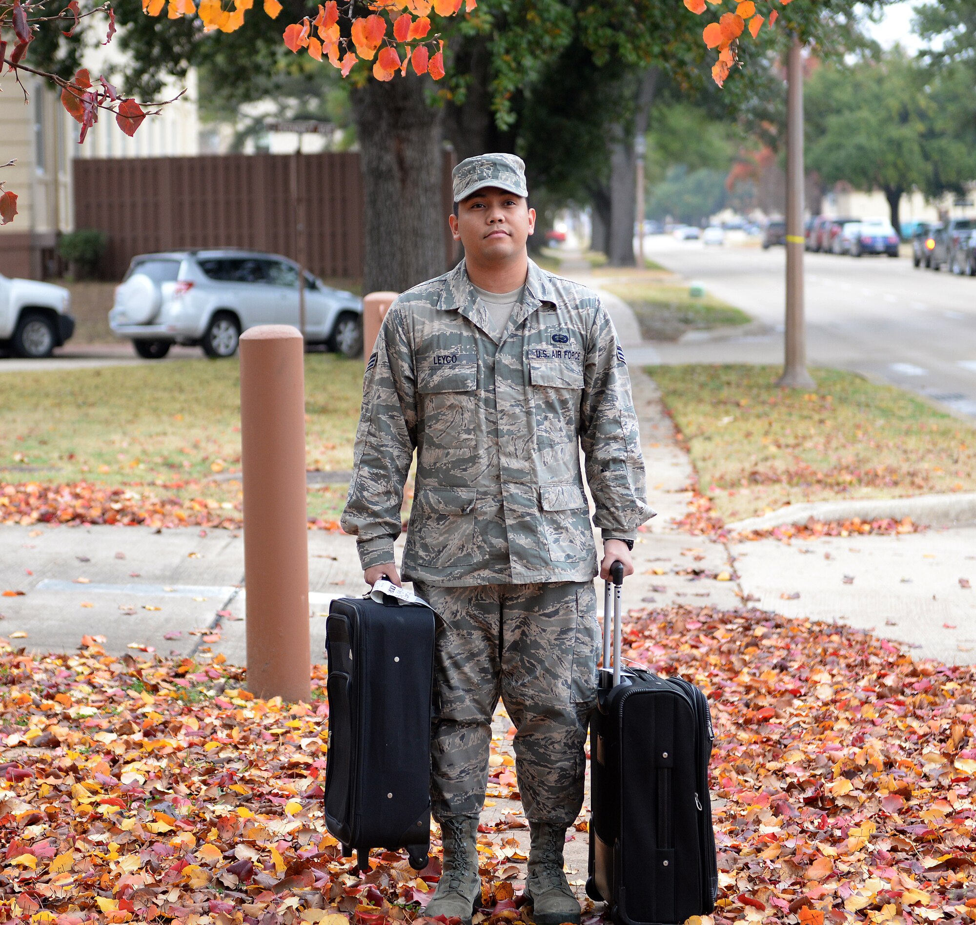 Senior Airman Ianerwin Leyco, 20th Bomb Squadron commander support staff, poses for a photo on Barksdale Air Force Base, La., Dec. 3, 2014. Leyco, who has only been able to see his family in Saipan, Mariana Islands, only one time in more than three years has been sponsored to go home for the holidays, made possible by Operation Bright Holiday. (U.S. Air Force photo/Airman 1st Class Curt Beach)