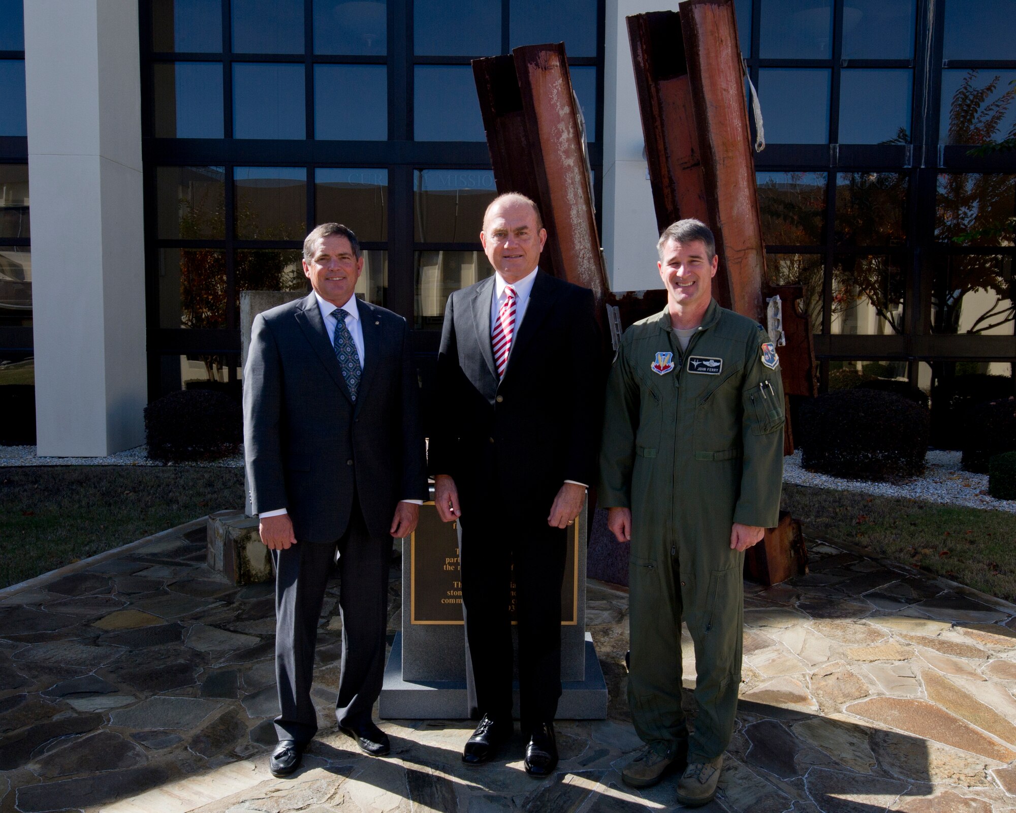 John Griffin, Air Forces Northern Chief of Staff, joins Gordon Tanner, Air Force General Counsel, and Col. John Ferry during a stop at the 9-11 Memorial at the 601st 