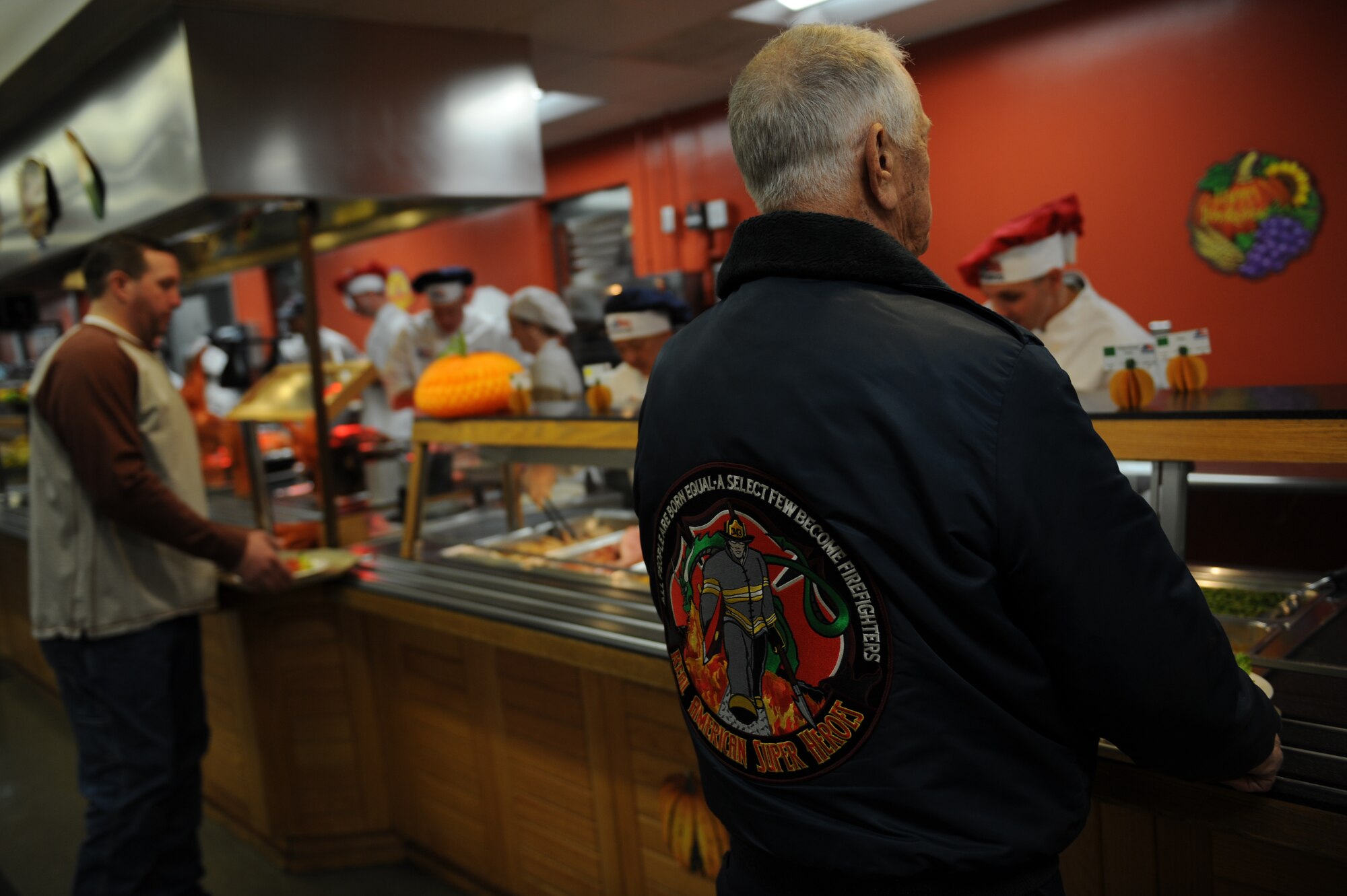 Retirees and Airmen are served a Thanksgiving meal at the Ozark Inn dining facility Nov. 27, 2014 at Whiteman Air Force Base, Mo. Retirees as well as Airmen and their families were invited to the event. (U.S. Air Force photo by Airman 1st Class Joel Pfiester/Released)
