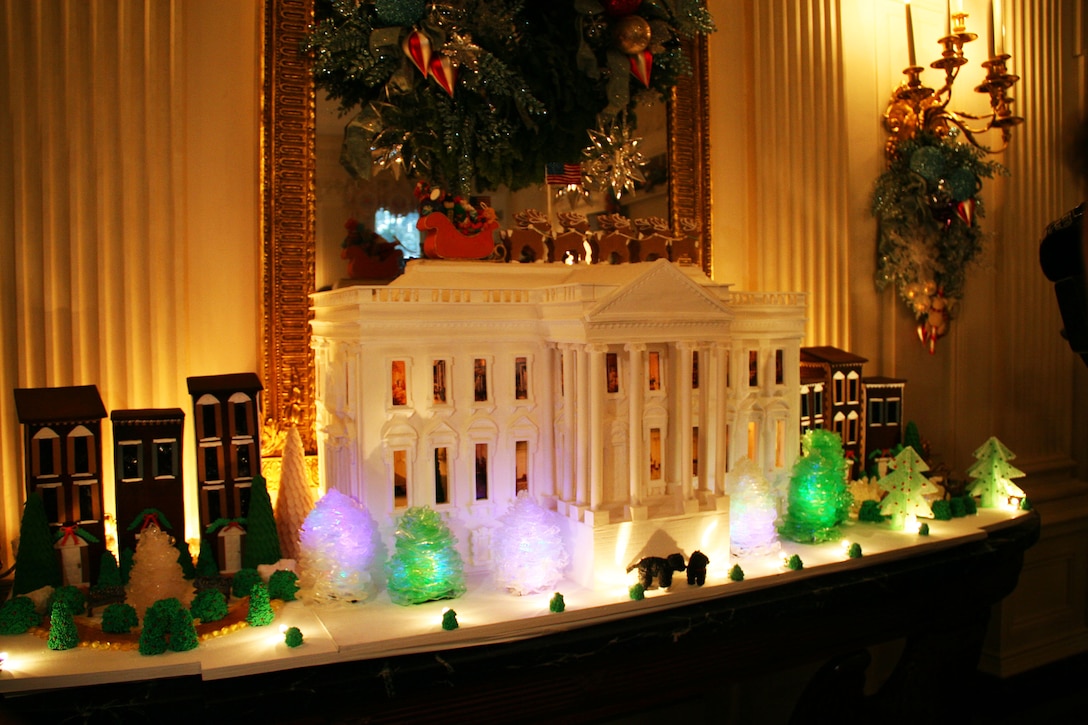 The White House gingerbread house displayed in the State Dining Room is made 250 pounds of pastillage, 40 pounds of marzipan, 25 pounds of gum paste, 80 pounds of gingerbread dough and 25 pounds of sugar. DoD photo by Terri Moon Cronk