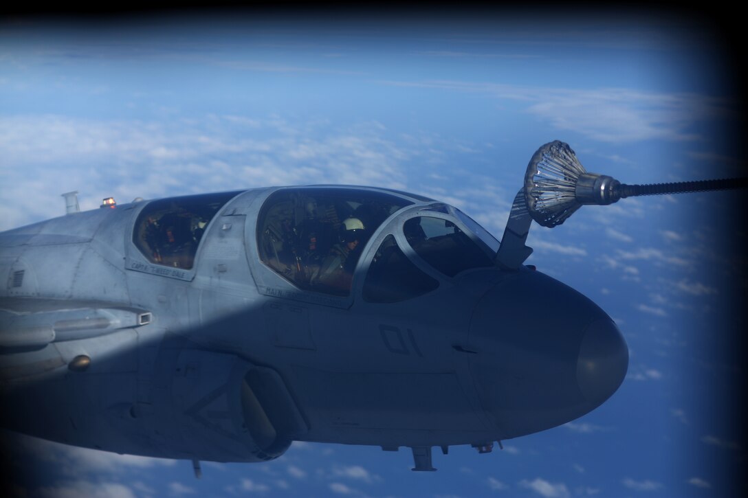 A Marine Corps EA-6B Prowler aircraft refuels off the coast of North Carolina, Dec. 2, 2014. The aircraft crew is assigned to the Marine Tactical Electronic Warfare Training Squadron 1.