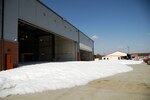 A validation test of the high expansion foam system is performed at the 188th Fighter Wing's new consolidated maintenance facility. It recently received a LEED Silver certification by the U.S. Green Building Council.